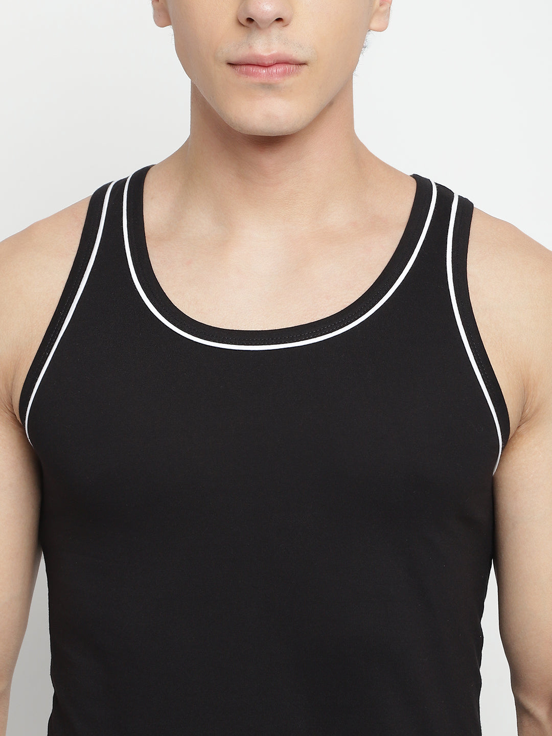 Three men's gym vests by La Intimo in a multipack, showcasing comfortable and stylish innerwear ideal for workouts and casual wear.