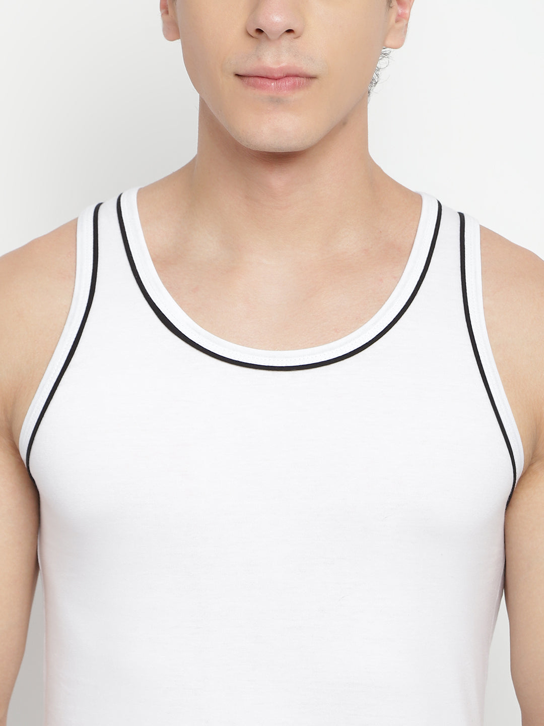 Three men's gym vests by La Intimo in a multipack, showcasing comfortable and stylish innerwear ideal for workouts and casual wear.