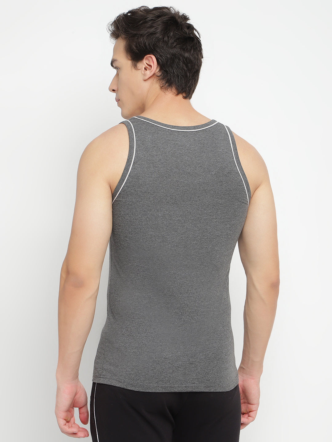 Three men's gym vests by La Intimo in a multipack, showcasing comfortable and stylish innerwear ideal for workouts and casual wear.