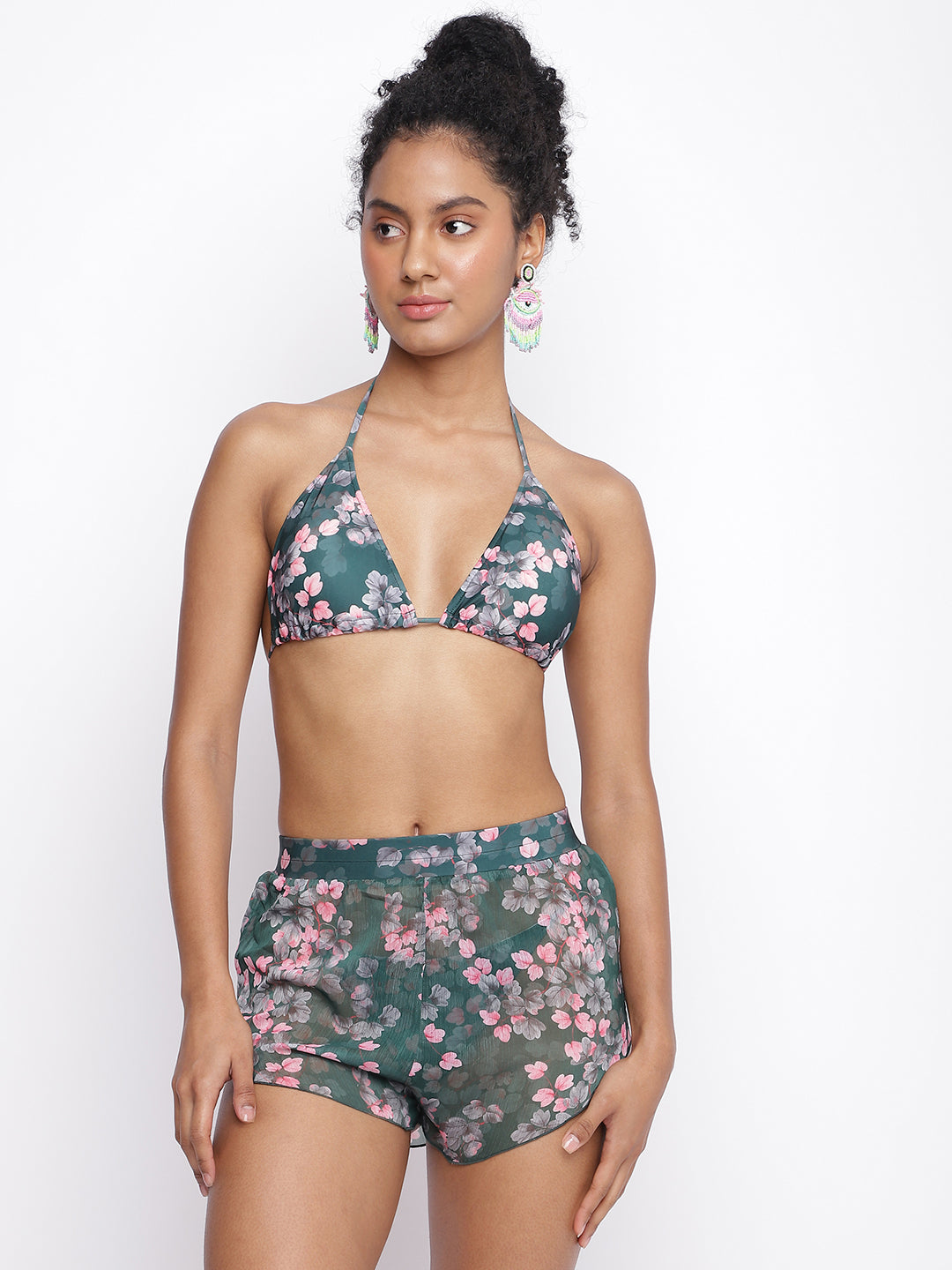 Luxury resortwear by La Intimo featuring a bikini set with a halter-neck design and matching shorts, available in a pack of 3.