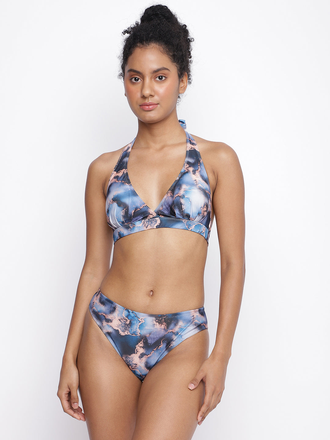 Luxury resortwear by La Intimo featuring a bikini set with a halter-neck design and matching skirt, available in a pack of 3.