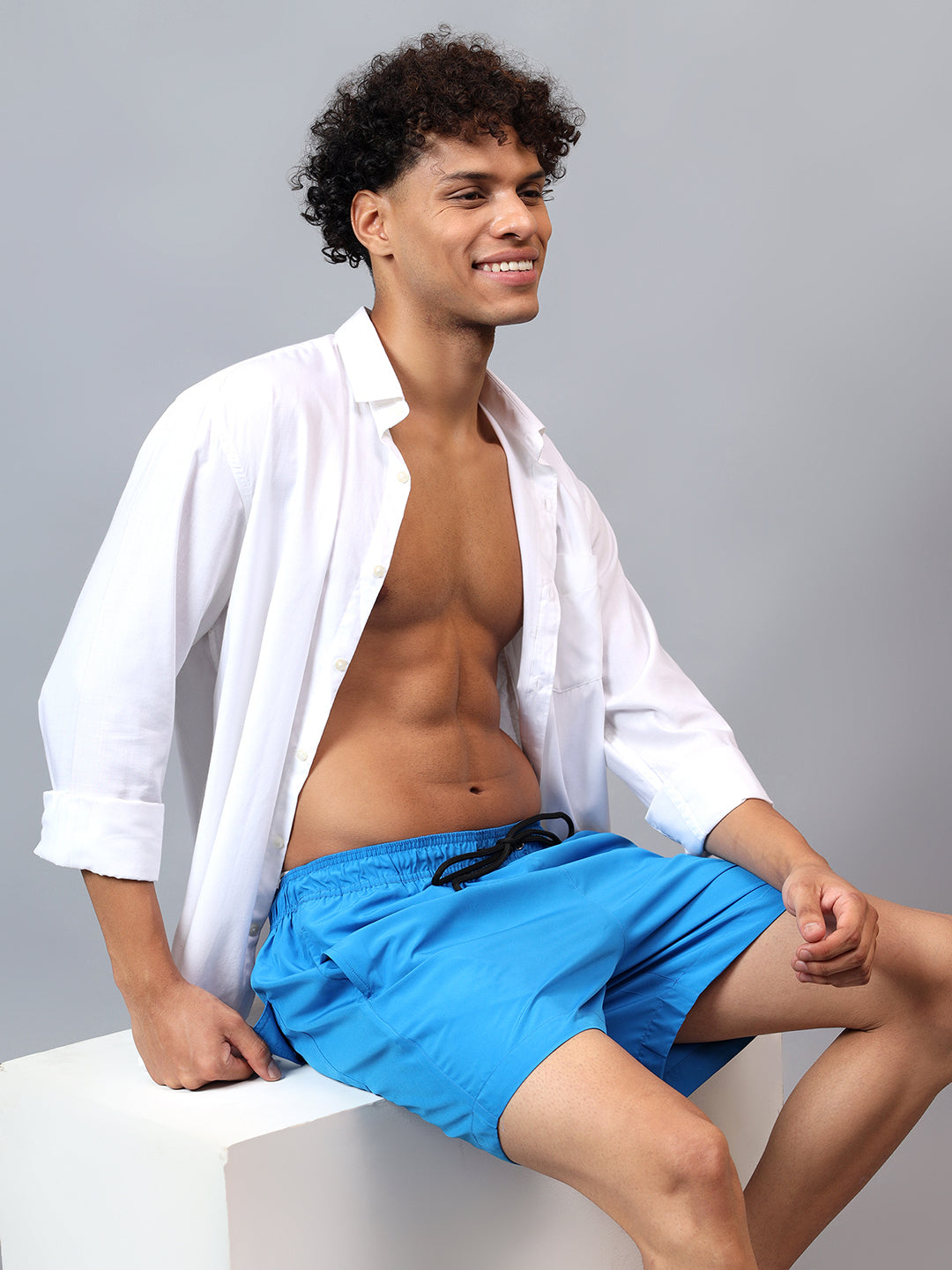 Luxury men’s swimwear – Oceanic solid Bermuda shorts from La Intimo, perfect for beach, pool, and leisure.